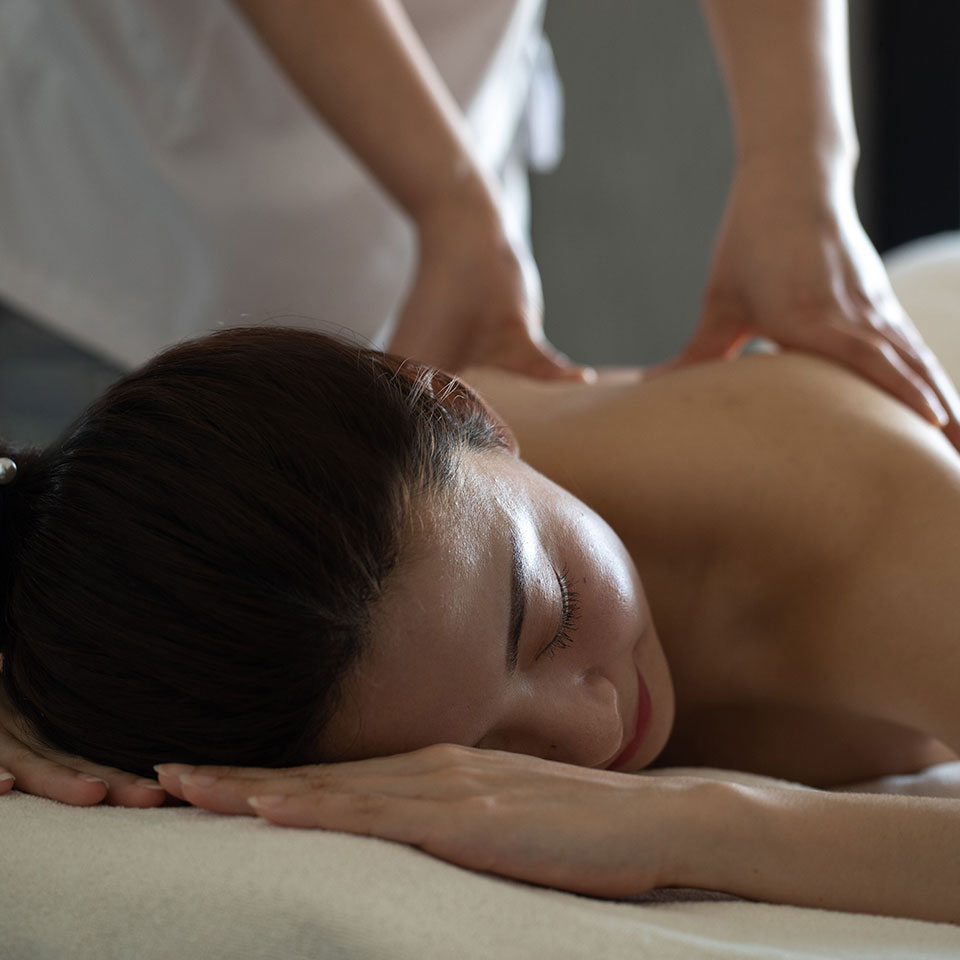 Woman relaxing with back massage